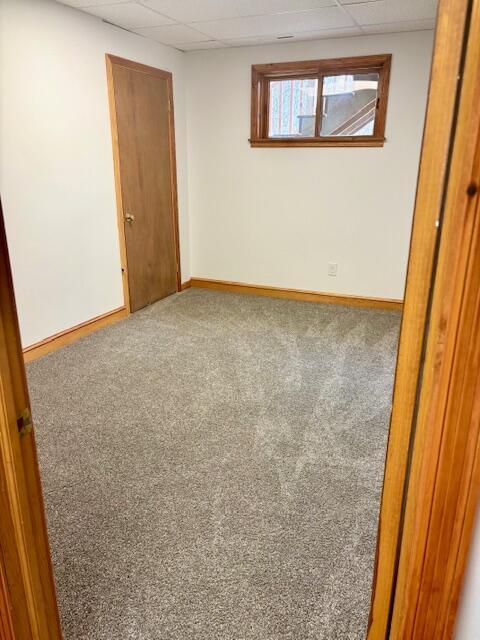 182 Dogwood Ln, Troutville, VA 24175 - unfurnished bedroom featuring carpet, baseboards, and a paneled ceiling