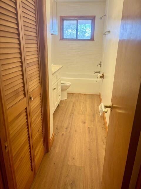 182 Dogwood Ln, Troutville, VA 24175 - full bathroom with bathing tub / shower combination, toilet, wood finished floors, and vanity