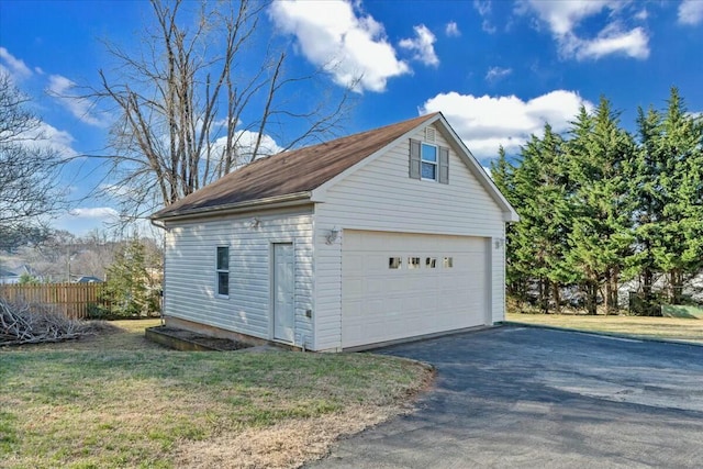 detached garage with fence