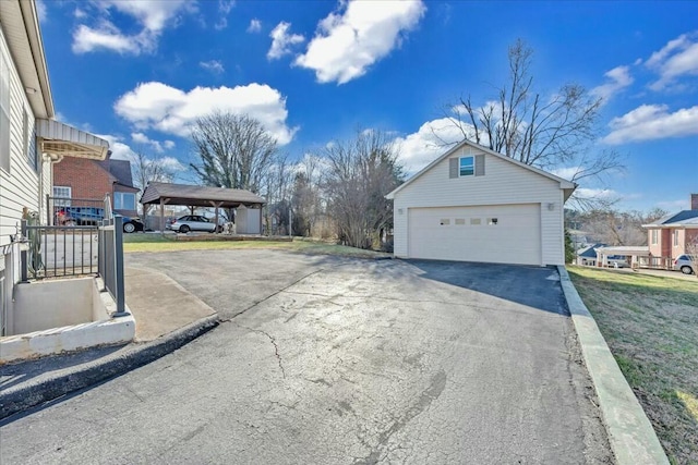 view of street featuring aphalt driveway