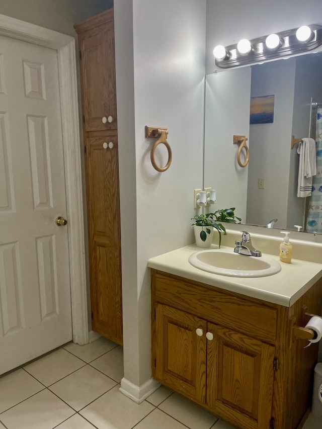 bathroom with vanity and tile patterned floors