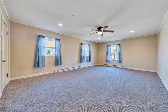 carpeted spare room featuring ceiling fan, a healthy amount of sunlight, and a baseboard radiator