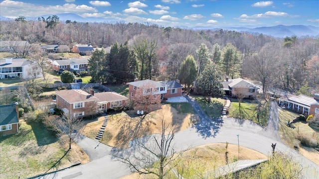 aerial view featuring a residential view and a view of trees