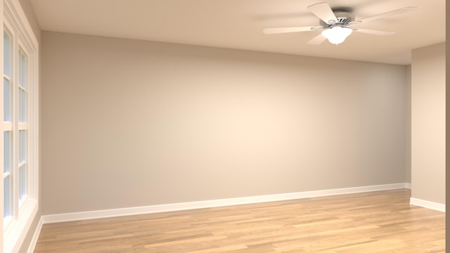 empty room featuring a ceiling fan, baseboards, and light wood-type flooring