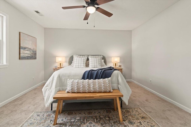 bedroom with baseboards and carpet floors