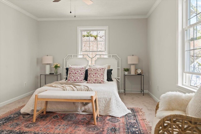 carpeted bedroom featuring baseboards, multiple windows, and crown molding