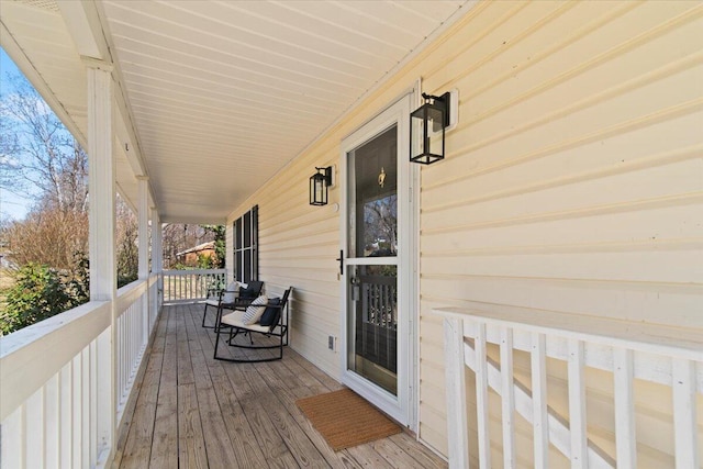 wooden deck featuring a porch