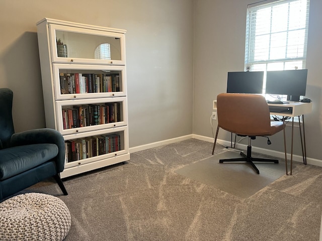 office with baseboards and carpet