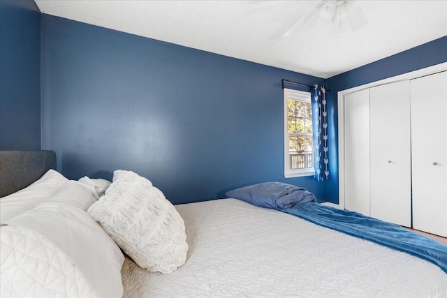 bedroom with a closet and ceiling fan