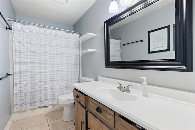 bathroom with vanity, shower / bath combo with shower curtain, a textured ceiling, tile patterned floors, and toilet