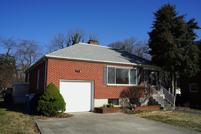 view of home's exterior with brick siding, concrete driveway, roof with shingles, a chimney, and a garage