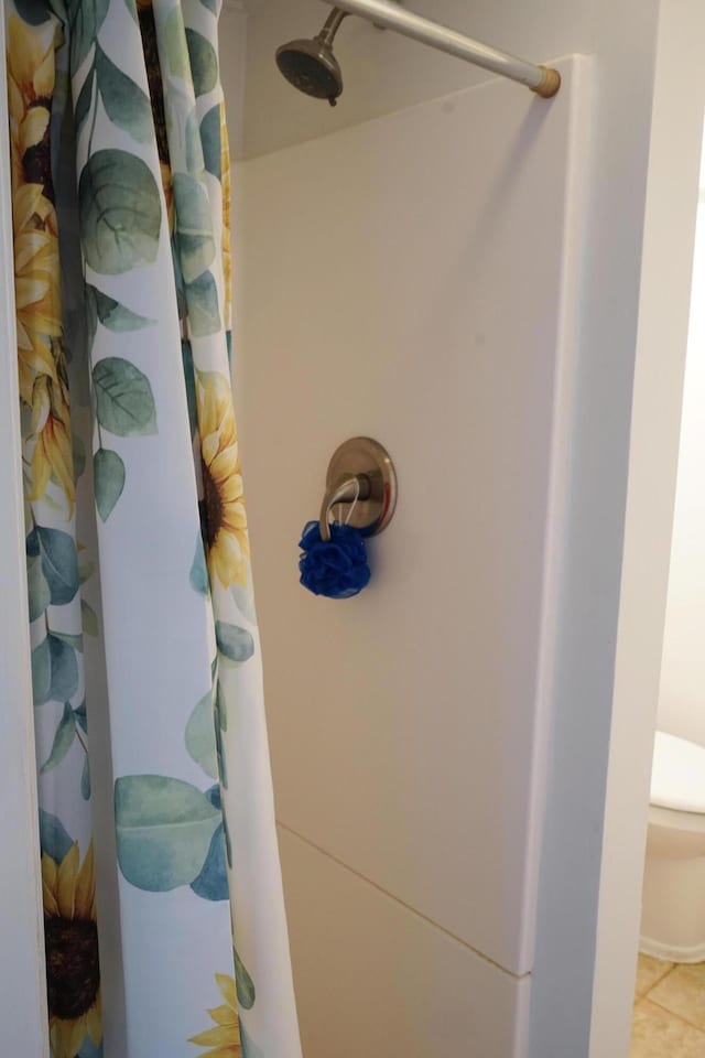 room details with curtained shower