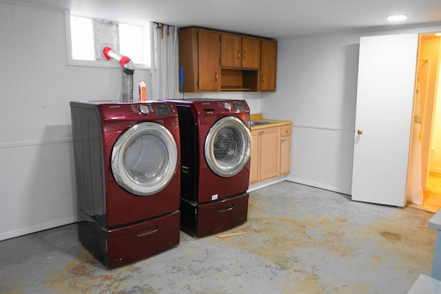 laundry area featuring cabinet space and washer and dryer