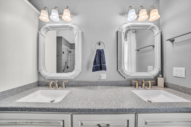 full bathroom featuring vanity and a shower