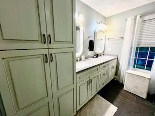 full bath with vanity and wood finished floors