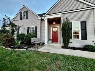 view of front of home with a front yard
