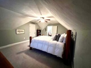 bedroom with baseboards, carpet, lofted ceiling, and a ceiling fan