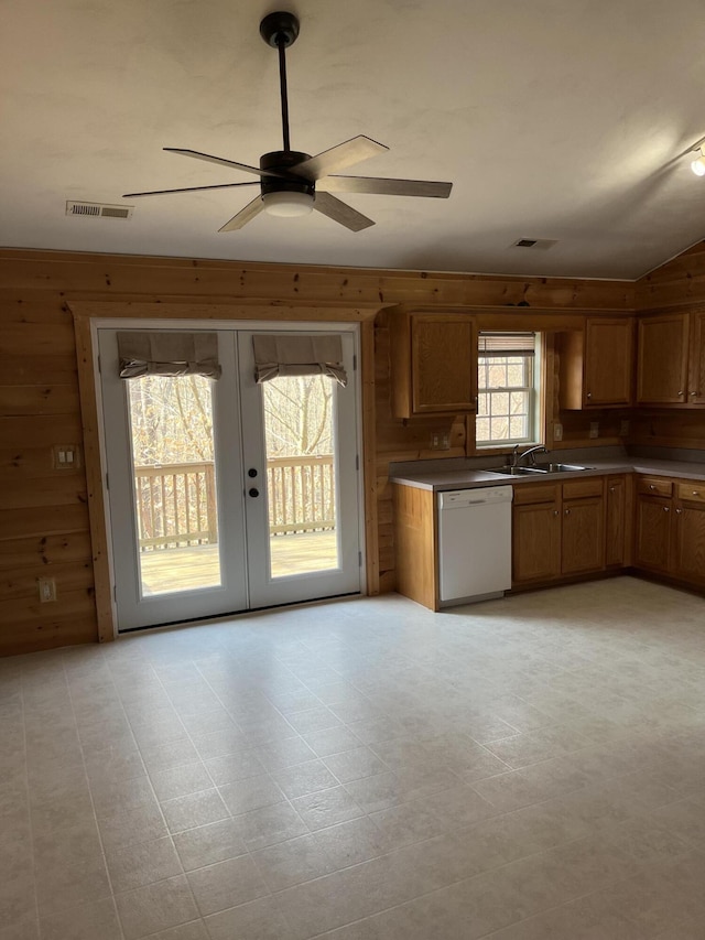 kitchen featuring a ceiling fan, visible vents, white dishwasher, french doors, and brown cabinets