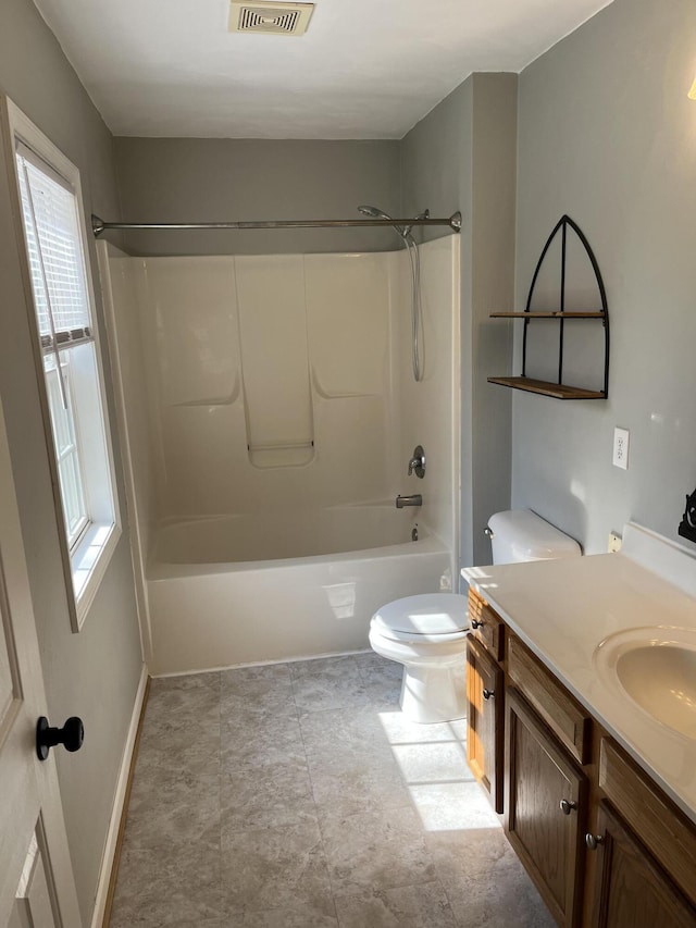 bathroom with visible vents, toilet, shower / tub combination, baseboards, and vanity