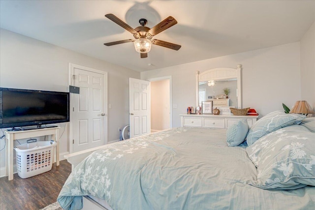 bedroom with dark wood-type flooring and ceiling fan