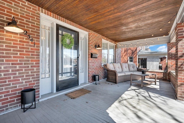 wooden terrace with a porch