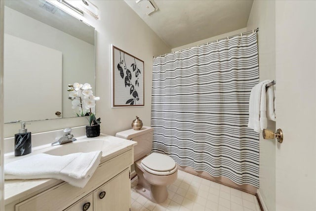 full bathroom with vanity, a shower with shower curtain, and toilet