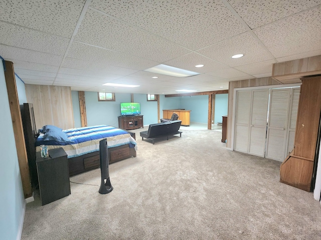 7167 Bent Mountain Rd, Roanoke, VA 24018 - carpeted bedroom with wood walls, recessed lighting, and a paneled ceiling