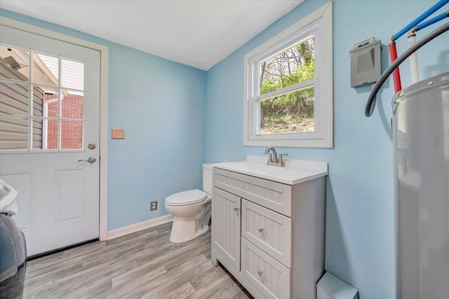 821 Kerns Ave SW, Roanoke, VA 24015 - bathroom featuring plenty of natural light, wood finished floors, and vanity