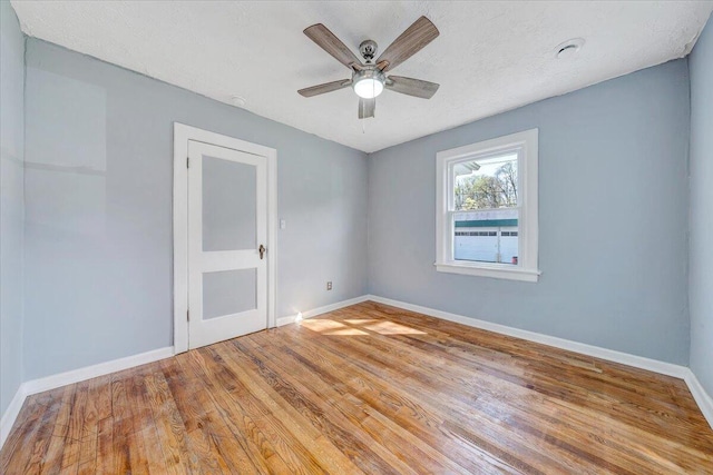 821 Kerns Ave SW, Roanoke, VA 24015 - unfurnished room with wood finished floors and ceiling fan