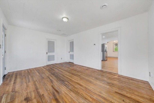 821 Kerns Ave SW, Roanoke, VA 24015 - empty room featuring wood finished floors