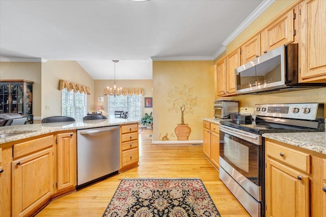 kitchen with stainless steel appliances, decorative light fixtures, light wood-type flooring, an inviting chandelier, and crown molding