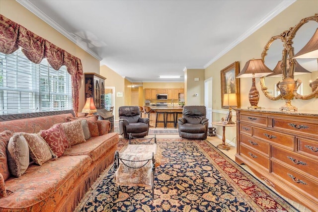 living room with crown molding and light wood-style flooring
