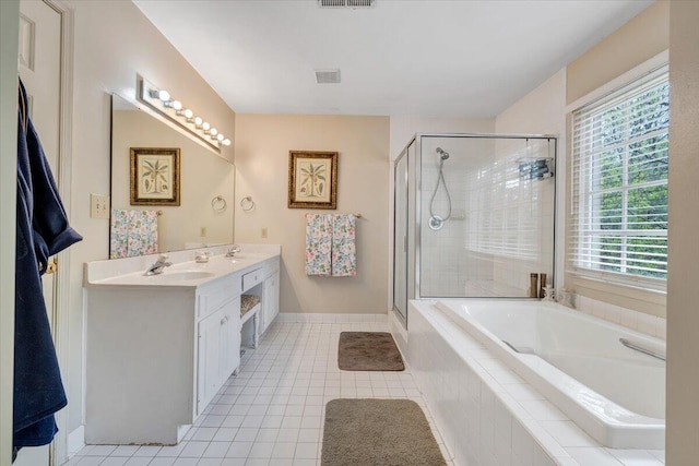 full bath with a stall shower, tile patterned flooring, a garden tub, and visible vents