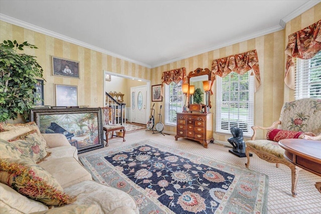 living area featuring baseboards, crown molding, wallpapered walls, and carpet floors