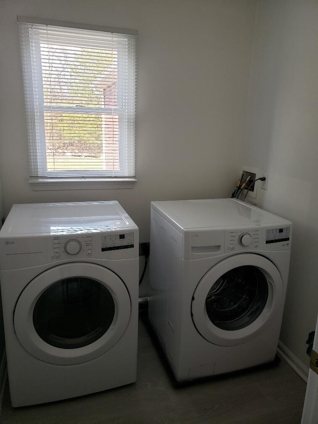 washroom with washer and dryer and laundry area