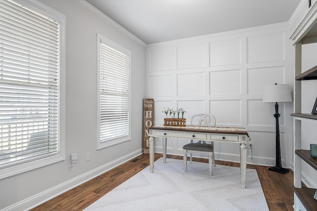 1042 Round Meadow Dr, Christiansburg, VA 24073 - home office featuring dark wood-type flooring, plenty of natural light, a decorative wall, crown molding, and baseboards