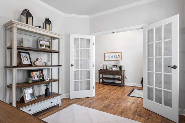 1042 Round Meadow Dr, Christiansburg, VA 24073 - living area with ornamental molding, french doors, wood finished floors, and baseboards
