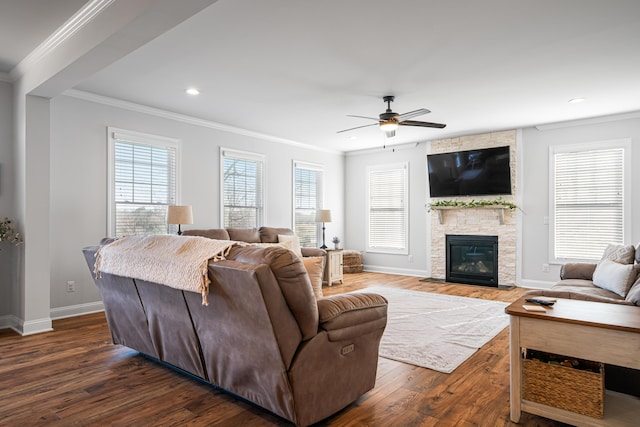 1042 Round Meadow Dr, Christiansburg, VA 24073 - living room featuring ornamental molding, a ceiling fan, dark wood-style flooring, plenty of natural light, and baseboards