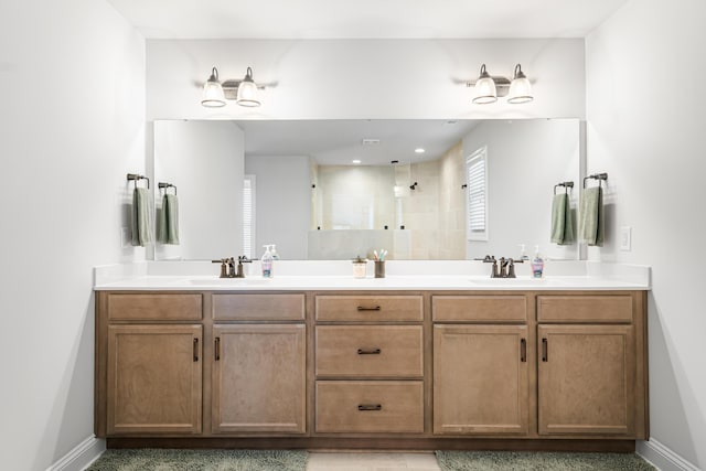 1042 Round Meadow Dr, Christiansburg, VA 24073 - full bath with tiled shower, double vanity, and baseboards