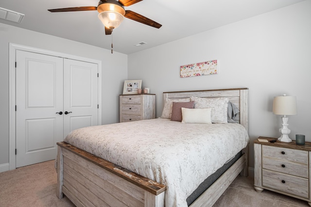 1042 Round Meadow Dr, Christiansburg, VA 24073 - bedroom featuring light colored carpet, a closet, ceiling fan, and baseboards