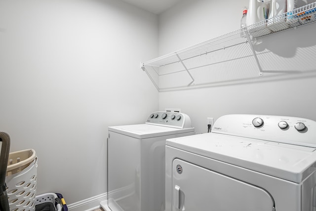 1042 Round Meadow Dr, Christiansburg, VA 24073 - washroom with washer and clothes dryer