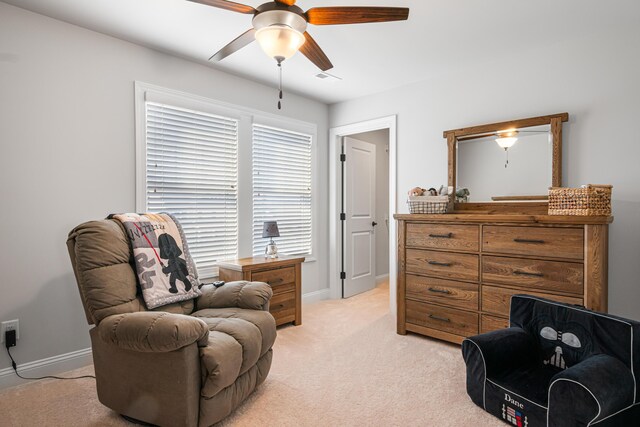 1042 Round Meadow Dr, Christiansburg, VA 24073 - sitting room featuring a ceiling fan, light carpet, and baseboards