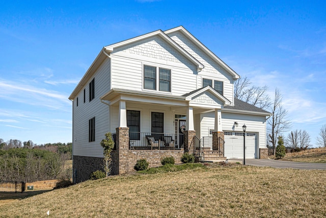 1042 Round Meadow Dr, Christiansburg, VA 24073 - craftsman-style home featuring covered porch, asphalt driveway, a front lawn, and an attached garage