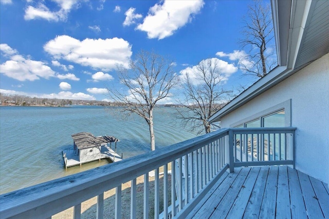 deck featuring a water view