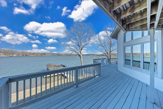 wooden terrace with a water view