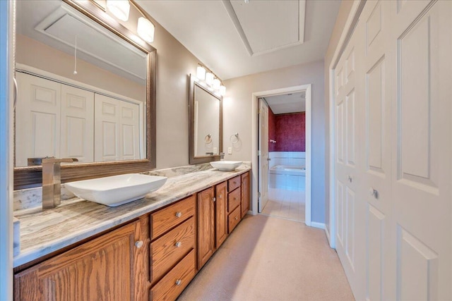 full bath featuring a sink and double vanity