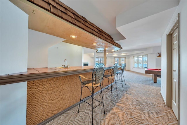 bar with recessed lighting, pool table, carpet, and a sink