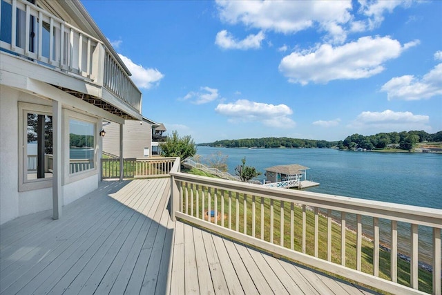wooden deck with a water view