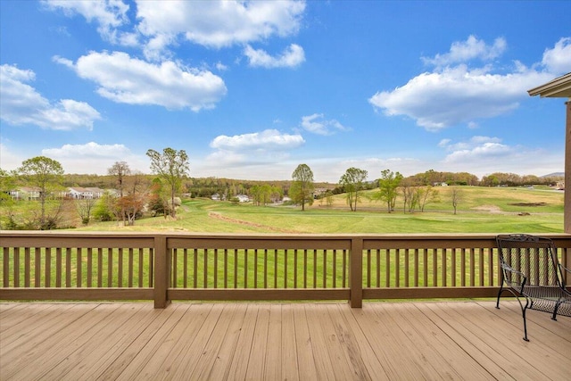 wooden deck with a yard
