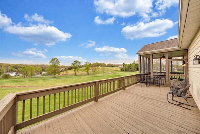 wooden deck with a yard